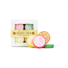 Load image into Gallery viewer, Colorful citrus fruit slices with packaging labeled 'Sidewalk Chalk' on a white background