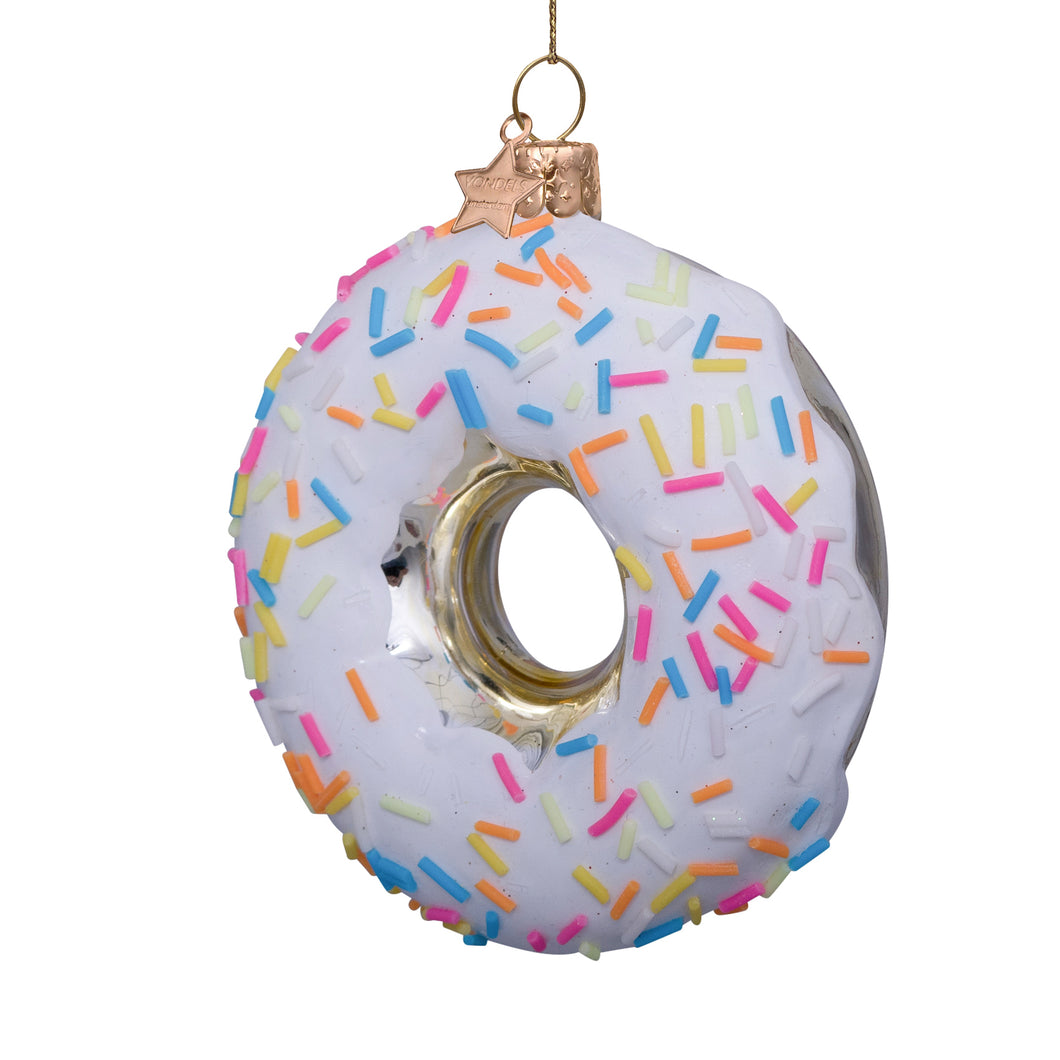 Decorative donut ornament with white icing and colorful sprinkles on a white background