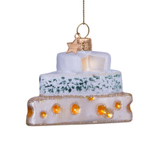 Load image into Gallery viewer, Decorative stack of cheeses  ornament with a candle on a white background
