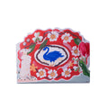 Decorative card with a blue bird illustration on a red background with flowers and animals.