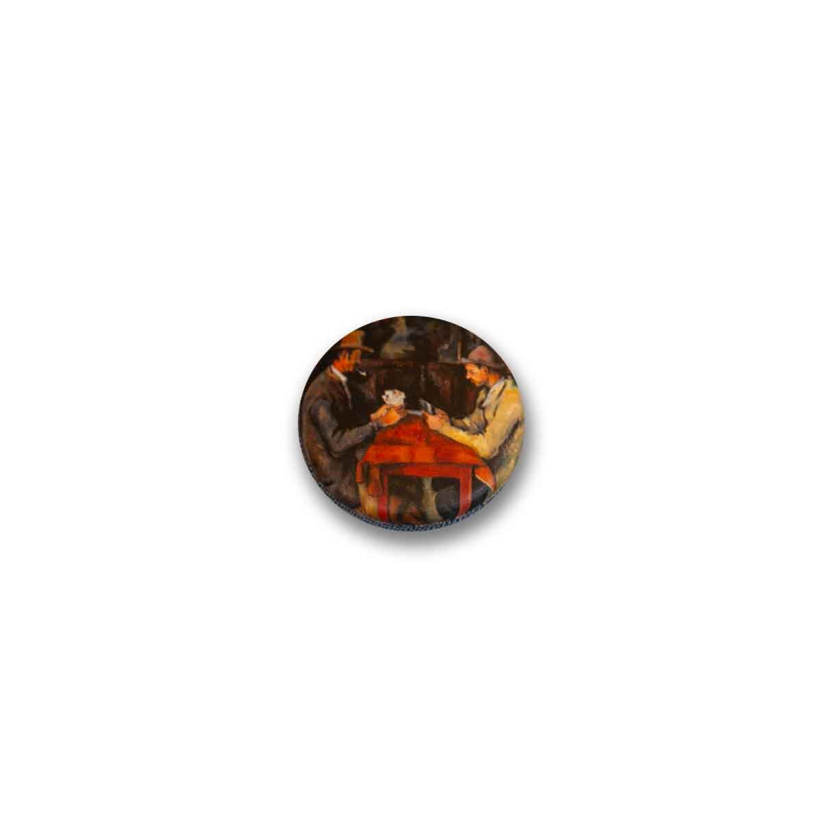 Round badge with Cezanne design on a white background