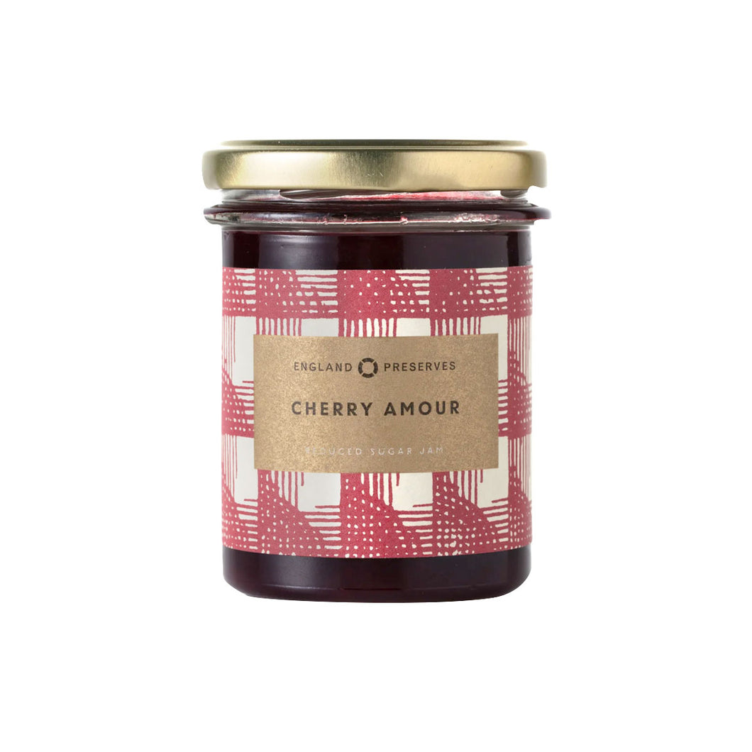 Jar of 'Cherry Amour' jam with a decorative label on a white background