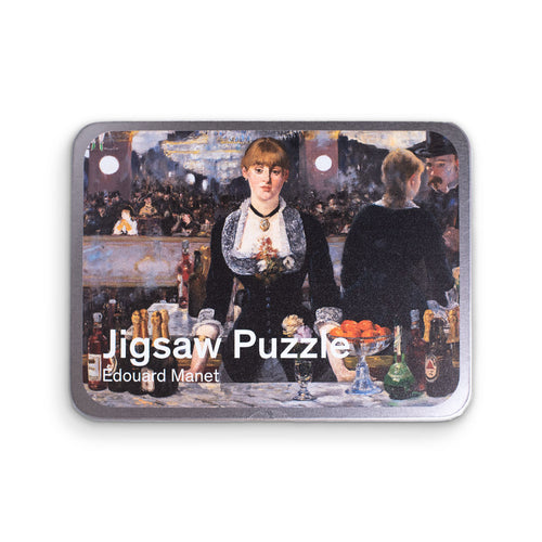 Jigsaw puzzle box featuring a painting by Edouard Manet on a white background