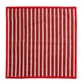 Red and white striped towel on a white background
