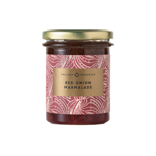 Jar of red onion marmalade with a decorative label on a white background