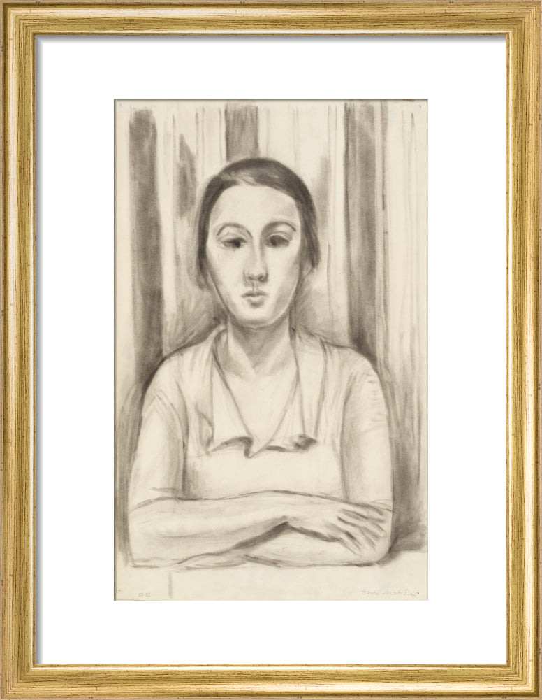 A Woman with her arms on a table