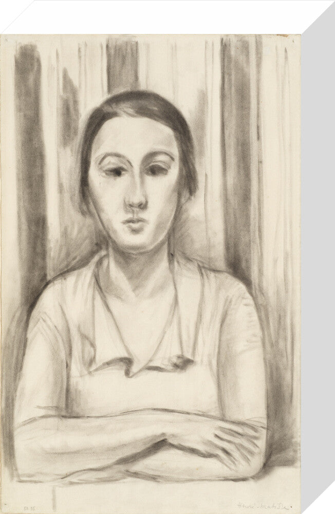 A Woman with her arms on a table