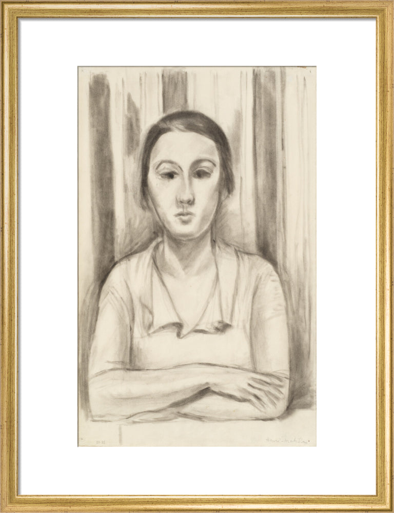 A Woman with her arms on a table