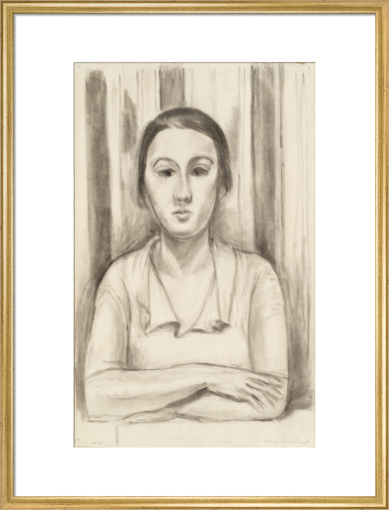A Woman with her arms on a table